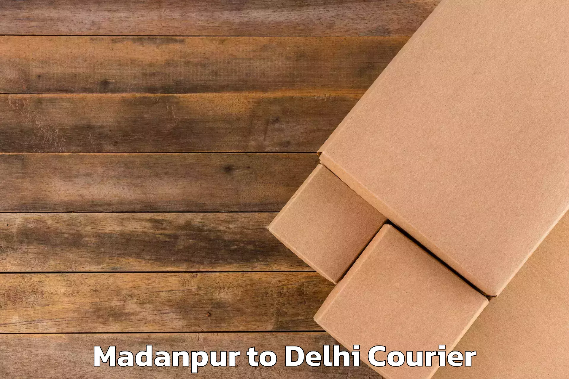 Luggage transport rates calculator Madanpur to Delhi Technological University DTU